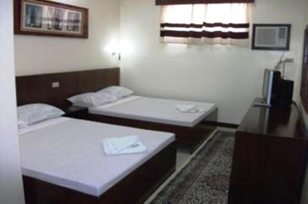 Ysabelle Mansion Bed & Breakfast Puerto Princesa Bilik gambar