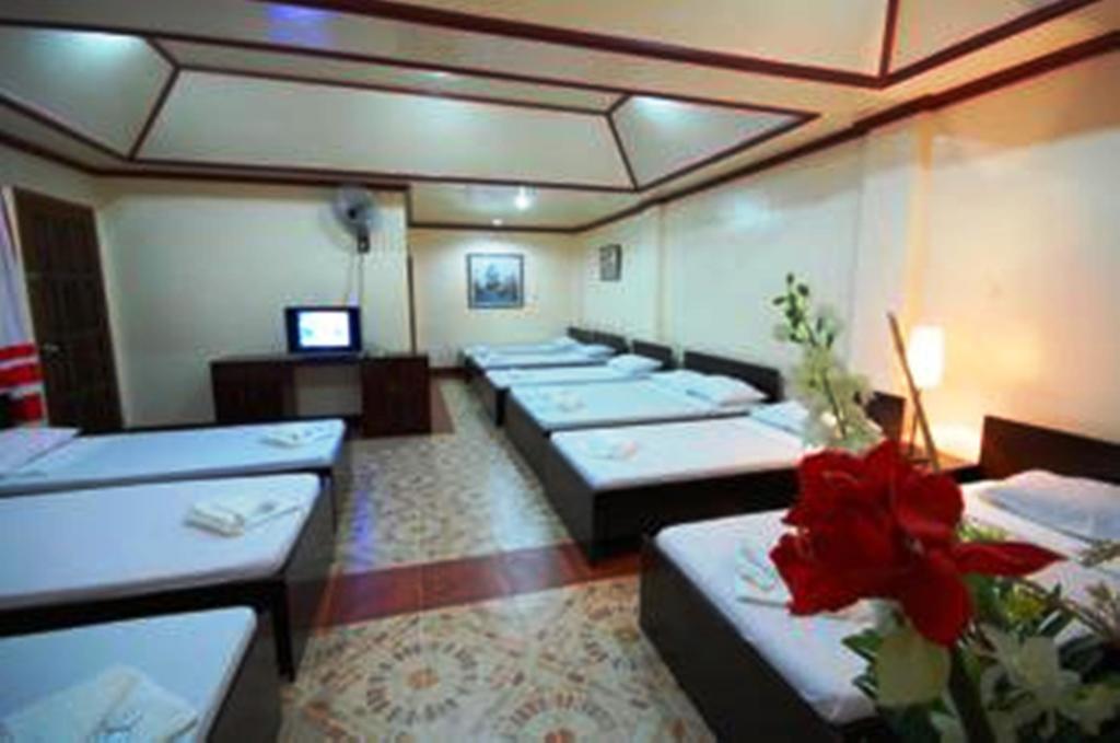Ysabelle Mansion Bed & Breakfast Puerto Princesa Bilik gambar
