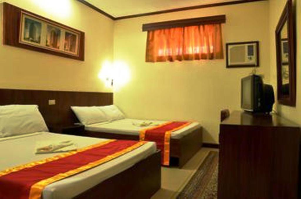 Ysabelle Mansion Bed & Breakfast Puerto Princesa Bilik gambar