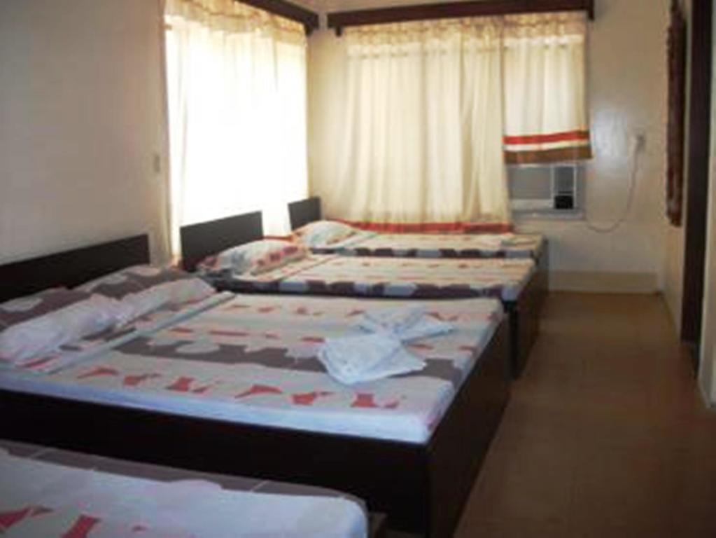 Ysabelle Mansion Bed & Breakfast Puerto Princesa Bilik gambar
